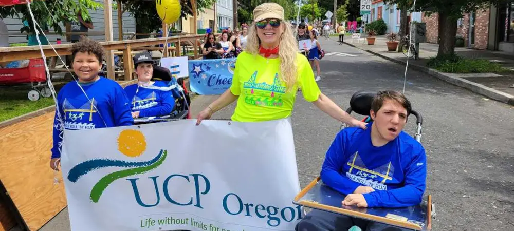 UCP Oregon participants and supporters marching in a community parade.